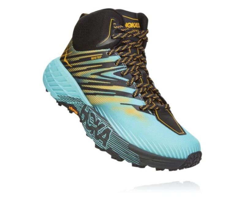 Hoka | Women's Speedgoat Mid GORE-TEX 2 Antigua Sand / Golden Rod